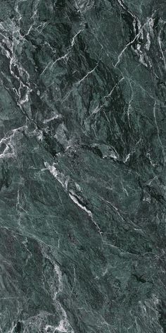 green marble textured with white and black streaks