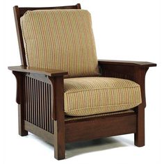 the arm chair is made from wood and has an upholstered cushion on it