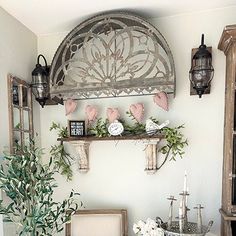 a living room filled with lots of furniture and decor on top of a wooden table