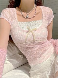 Shop coquette ྀིྀིྀིྀིྀི top on YESSTYLE! Use code: FLOWER808 to save money! 🎀 Sosana - Short-Sleeve Mock Two-Piece Bow Accent Lace Crop Top #coquette #yesstyle #fashion #lewkin #cider #shein #pink #wonyoung #wonyoungism #wonyoungpics #girl #girlhood #girlboss #pretty #lacey #kfashion #kbeauty #koreanfashionoutfits #korean #skincare #summer #closet #barbie #swan #ballet #aesthetic Cute Pullovers, Crop Top Y2k, Aesthetic T Shirts, Short Sleeve Cropped Top, Lace Crop Tops, Print Crop Tops, Kawaii Clothes, Slim Fit Shirt, Y2k Aesthetic