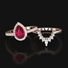 ✤ ITEM DESCRIPTION  Metal Availability : Sterling Silver,14K/18K Gold Setting : Prong Stamped : 925,14K,18K Gemstone : Simulated Ruby Size - 6×9mm ✤ CUSTOM ORDER We can create almost any rings, earrings, necklace you desire with high quality and affordable price. Please message us for Details. Curved wedding bands can be customized for your engagement ring. Please order ASAP and send me some pictures of your ring. ✤ ENGRAVING I will be happy to add engraving to my jewelry if possible. please message us. ✤ ABOUT LURALOR We create our jewelry with much love and care. Don't forget that happiness is handmade job. Last but not least, we hope you to enjoy our collection as much as we did creating it. When you purchase a piece from Luralor, you can know that you're getting quality hand-crafted je Lab-created Ruby Ring With Halo Setting For Promise, Pear-shaped Ruby Ring With Diamond Halo Setting, Ruby Ring With Halo Setting For Promise, Pear-shaped, Gift Pear-shaped Red Ruby Ring, Elegant Pear-shaped Pink Ruby Ring, Rose Gold Ring Set, July Birthstone Ring, Ring Rosegold, Teardrop Ring