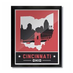 an orange and black framed poster with the words cincinnati, ohio in front of a cityscape