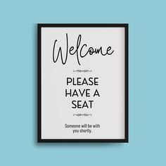 a black and white poster with the words welcome please have a seat, on a blue background