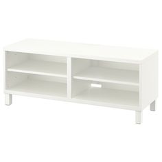 a white entertainment center with two open shelves