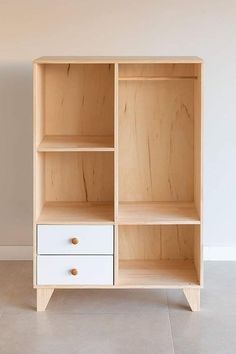 an open bookcase with two drawers on one side and another drawer on the other