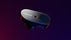 the back end of a sony headphones with red and blue lights in the background