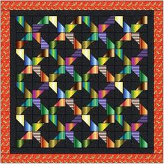 a quilt with many different colors and shapes on the front, along with an orange border