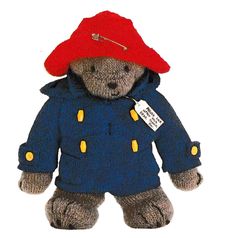 a teddy bear wearing a red hat and blue coat with buttons on it's chest