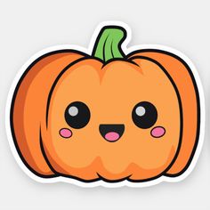 an orange pumpkin sticker with black eyes