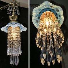 two chandeliers hanging from the ceiling, one in blue and one in gold