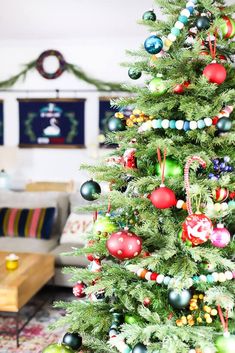 a decorated christmas tree in a living room