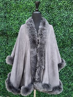 Now, this is très chic! This fur will elevate any Winter outfit. Throw this on top of any holiday dress to add warmth and drama!! The open cape style allows for it to be worn thrown over one shoulder or normally with the hook and eye. Style: Suede cloth faux fur-edged cape Neckline: Faux fur collar Closure: Single hook and eye Shell: 100% Polyester Wash instructions: Hand wash cold, tumble dry low Cape Style, Throw Over, The Hook, Holiday Dress, Tres Chic, Gift Boutique, Faux Fur Collar, Fur Collar, Fur Collars