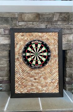 a brick fireplace with a dart in the center