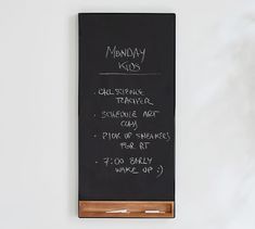 a blackboard with writing on it that says monday kids