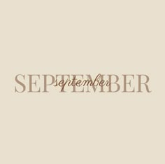 the word september written in brown on a beige background