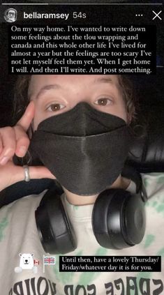 a woman with headphones covering her face and wearing a mask to protect herself from the sun