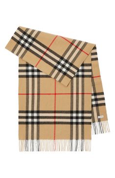 A bold archival check lends signature distinction to a supremely soft cashmere scarf tipped with slim fringe. 79" x 20"; 3" fringe 100% cashmere Dry clean Made in the UK Giant Check, Personalized Scarves, Burberry Scarf, White Scarves, Checked Scarf, British Outfits, Personalized Gifts For Kids, Cashmere Scarf, Wool Scarf