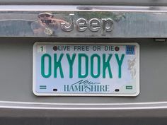 a license plate that reads,'live free or die okydoky new hampshire '