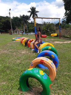 a woman sitting on top of an inflatable playground