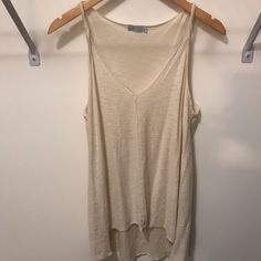 Cute Boho Twisted Strap Tank. Nwot Size Small. Vneck Loose Fitting Style. Beige V-neck Summer Top, Neutral V-neck Beach Top, Beige V-neck Tank Top For Summer, Neutral V-neck Top For Day Out, Neutral Cotton Tank Top For Spring, Spring Neutral Cotton Tank Top, Summer Beige V-neck Top, Sleeveless Neutral Tops For Summer, Neutral Sleeveless Tops For Summer