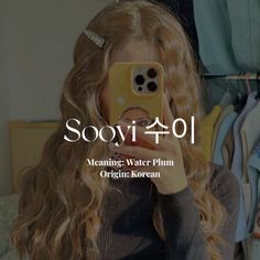 a woman taking a selfie with her cell phone in front of her face and text reading sooyi + 0 meaning water plum origin korean korean