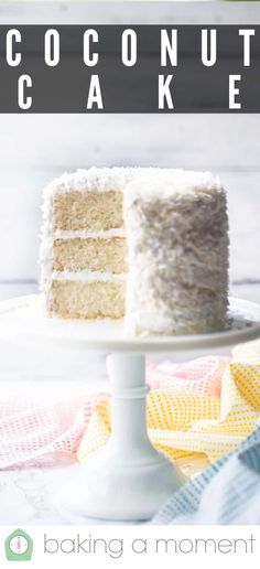 a close up of a cake on a plate with the words coconut cake above it