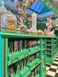 a candy store filled with lots of different kinds of candies and lollipops