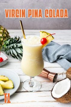 a pineapple drink in a tall glass with a straw garnish