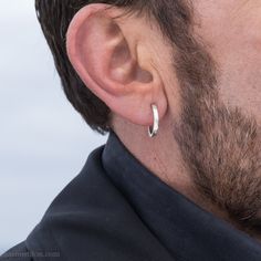 These 925 sterling silver hoop earrings for men or women are made by me, in the beautiful Pacific Northwest of North America. Size: 18mm exterior diameter, 15mm interior diameter, 2mm wide. Solid sterling silver posts and backs. I strive to run an ecologically sustainable business. - GUARANTEED forever against breakage due to normal use.  - SUSTAINABILITY: I use silver and gold with a post consumer content from precious metals manufacturers that purchase new metals from fair labor practicing mines. I believe that purchasing high quality jewelry with a post consumer content that is repairable and recyclable is very important. I make jewelry in small batches, minimizing waste and resources wherever I can. My manufacturing processes strives to strengthen the metal by using hand forming techni Minimalist Polished Sterling Silver Huggie Earrings, Minimalist Polished Silver Huggie Earrings, Minimalist Silver Huggie Earrings With Polished Finish, Simple Sterling Silver Huggie Jewelry, Simple Silver Sterling Huggie Earrings, Simple Silver Sterling Silver Huggie Earrings, Simple Sterling Silver Huggie Earrings, Hoop Earrings Aesthetic, Hoop Earrings For Men