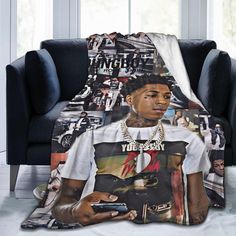 a couch with a blanket on top of it covered in photos and the words you can't stop