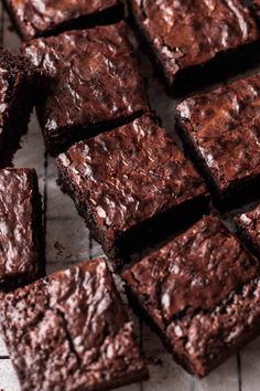 chocolate brownies on a cooling rack ready to be cut into bite size pieces for dessert