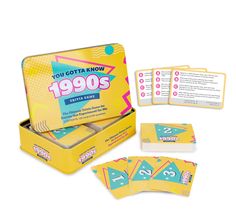 an unopened card game in a yellow box with matching cards on the front