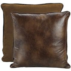 two brown pillows sitting next to each other