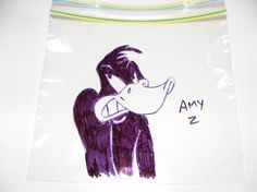 a child's drawing of an angel with the name amy 2 on it