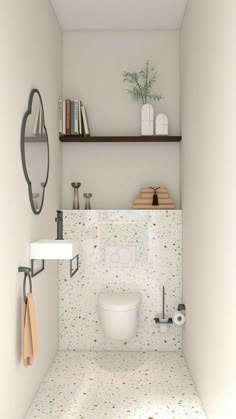 a white toilet sitting inside of a bathroom next to a shelf filled with books and other items