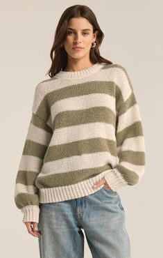 Chill out in style with this relaxed crew neck sweater, featuring long blouson sleeves and a classic stripe design. This effortless piece adds an easygoing option to your wardrobe while keeping you cozy and chic. Outerwear Vest, Sweater Blouse, Striped Knit, Look Chic, Stripe Sweater, Stripes Design, Outerwear Jackets, Crew Neck Sweater, Neck Sweater