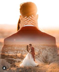 a man and woman are kissing in the desert