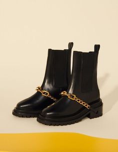 SANDRO - Ankle boots with notched sole and chain (EU 36) | eBay Boots Sandro, Chain Boots, Winter Sunglasses, Sandro Paris, Leather High Tops, Black Chain, Boots Ankle, Womens Ankle Boots, Mid Calf Boots