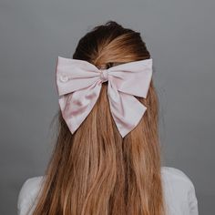 Add a personalized touch to your hairstyle with this stunning satin hair bow featuring a delicate pearl monogram charm. Crafted from soft pink satin, this elegant bow is perfect for weddings, bridesmaids, or any special occasion where you want to make a statement. The custom monogram adds a unique and thoughtful detail, making it a beautiful gift for a loved one or a keepsake for yourself. Ideal for bridal parties, holiday events, or as a luxurious everyday hair accessory. Length 5 inches (10 cm Bridal Hair Bow, Pink Hair Bow, Everyday Hair, Pink Hair Bows, Bow Christmas, Bridal Parties, Holiday Events, Etsy Personalized Gifts, Everyday Hairstyles