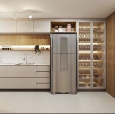 a modern kitchen with white cabinets and stainless steel refrigerator freezer in the center, surrounded by glass shelves