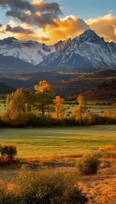 the mountains are covered with snow in the distance, and there is no image on this page to describe