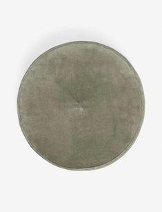 a round gray rug on a white background