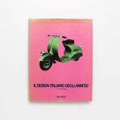 a pink book with a green scooter on it