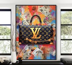 a louis vuitton bag is hanging on the wall next to a vase with money