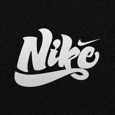 the nike logo on a black background with white spray paint and letters that spell it