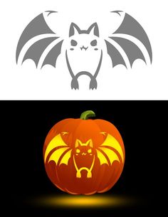 a pumpkin with an image of a bat on it and the shape of a cat