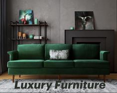 a green couch sitting on top of a wooden floor next to a shelf filled with vases