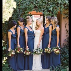 a group of women standing next to each other