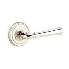 a chrome door handle on a white background