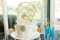 a white cake sitting on top of a table